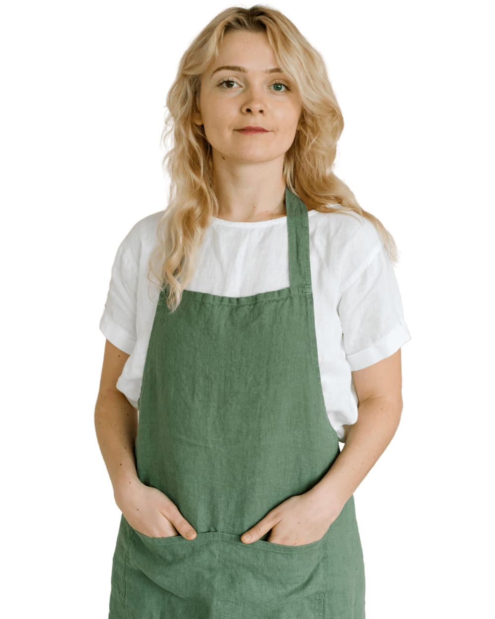 A shop owner in an apron